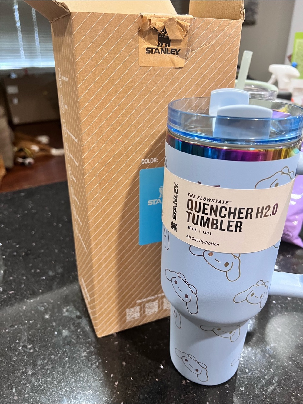 Stanley Light Blue Quencher H2.0 Tumbler with Cartoon print.